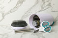 Load image into Gallery viewer, The BrushPod by Kuba & Leia. Catnip infused cat brush, catnip, laser toy and claw clippers
